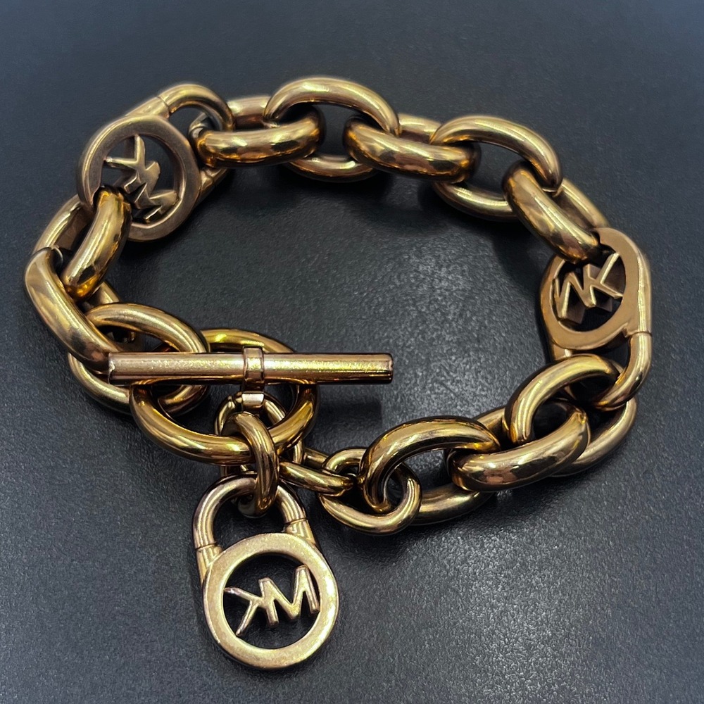 Michael Kors Gold Tone Logo Padlock Chain Link Heavy Bracelet
Toggle Closure 8"